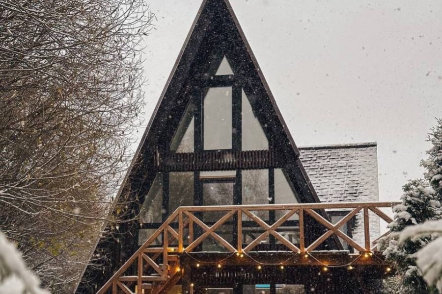 Треугольный дом